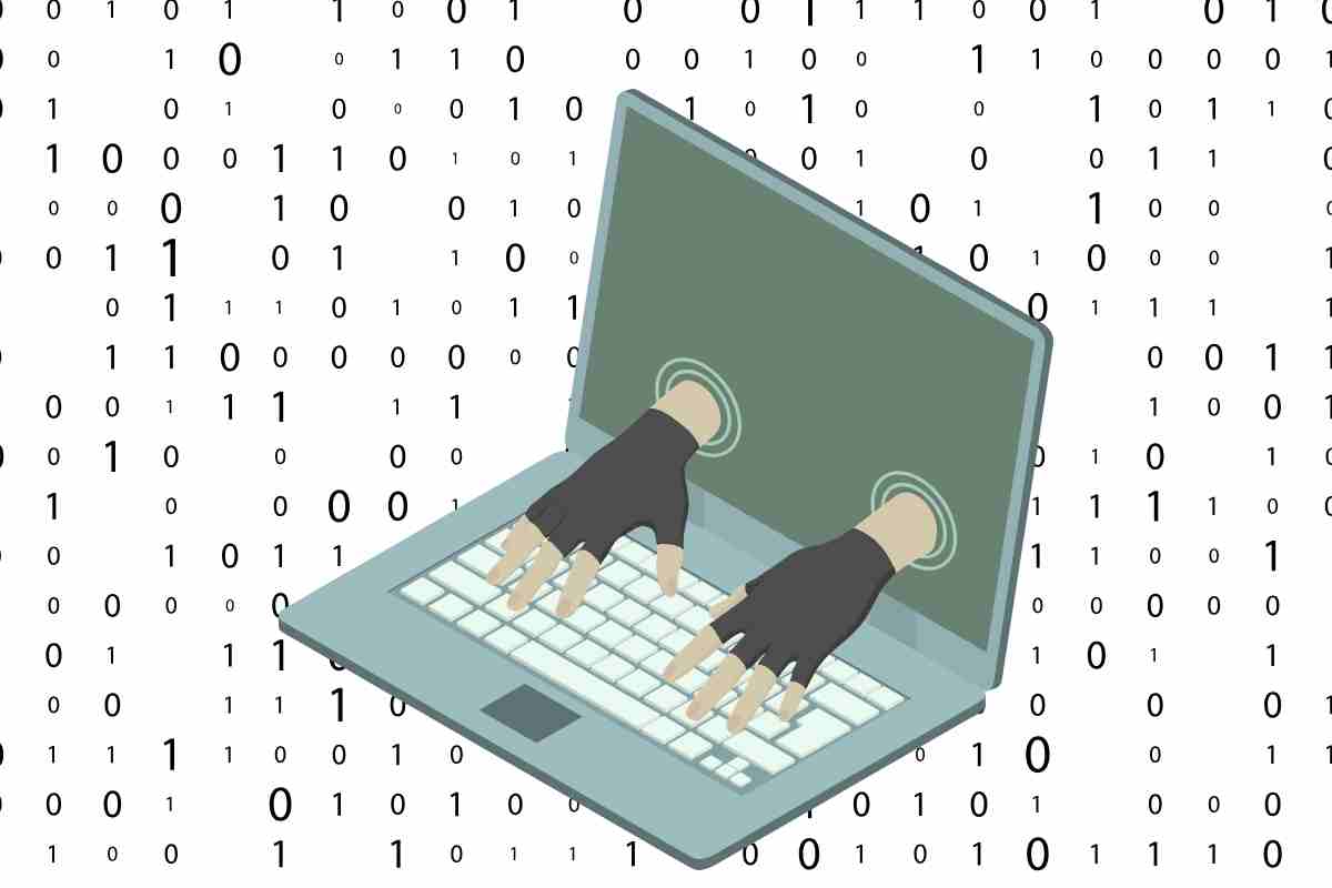 mani di un hacker che escono dallo schermo