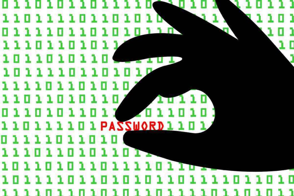 disegno di mano nera che prende una password